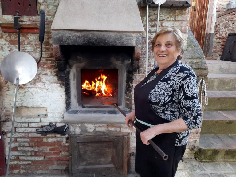Ester preparing the oven for our Pizza class